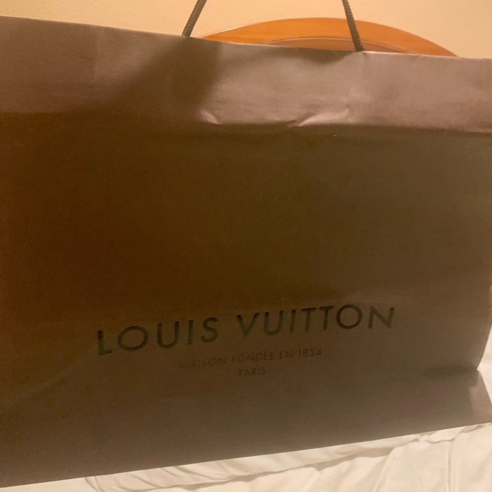 Like new, rate and authentic Louis  Vuitton authentic vintage shopping bag.